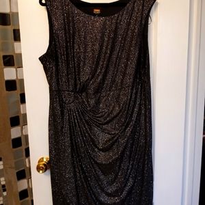 Gorgeous shimmer dress with ruching in the perfect place!